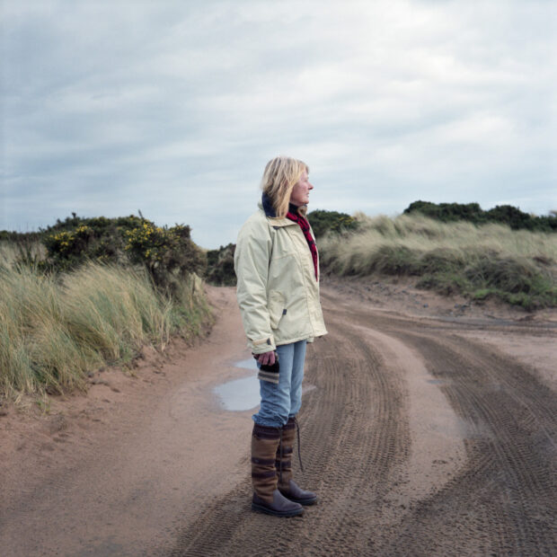 Susan Munro looks over the changed landscape outside her house. Susan Munro is one of the residentsliving on the Menie estate. Aftershe refused an offer from Trump tobuy her house, she has seen thelandscape outside her front doorchange dramatically o