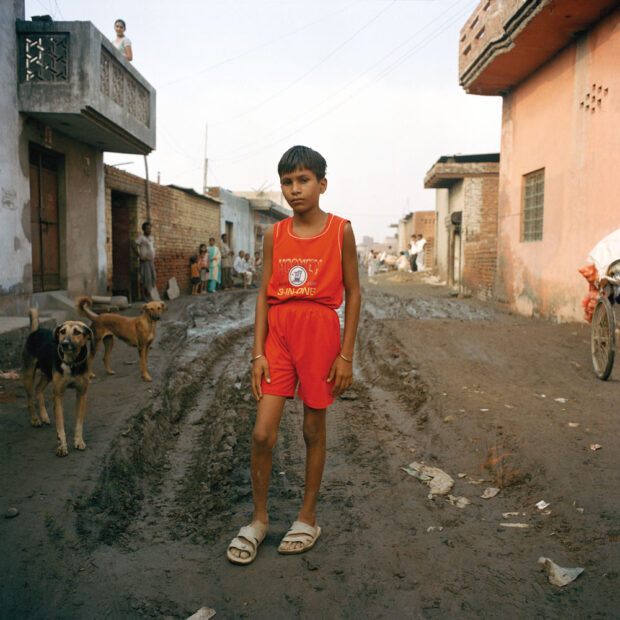 Zayek 12, Anup Vihar, Delhi, “The fumes get worse at night time, sometimes it’s hard to breathe, you feel like you’re choking. A girl died here last year, she had asthma and one night the fumes were really bad, she choked, she suffocated. The people from my village have fought and argued with workshop owners and they’ve been to the police but the police are being bribed so nothing changes. It’s still really bad some nights. I don’t like living here, I moved here with my parents and sister and brother nearly 6 years ago. We’re from Gwalior, in Uttar Pradesh but there is no work there, we can’t afford to go back”. © Sophie Gerrard 2006, all rights reserved Zayek 12, Anup Vihar, Delhi, “The fumes get worse at night time, sometimes it’s hard to breathe, you feel like you’re choking. A girl died here last year, she had asthma and one night the fumes were really bad, she choked, she suffocated. The people from my village have fought and argued with workshop owners and they’ve been to the police but the police are being bribed so nothing changes. It’s still really bad some nights. I don’t like living here, I moved here with my parents and sister and brother nearly 6 years ago. We’re from Gwalior, in Uttar Pradesh but there is no work there, we can’t afford to go back”. © Sophie Gerrard 2006, all rights reserved
