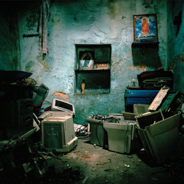E-waste stored in a home in the Christian Quarter of Chennai. The unregulated recycling industry in India takes place in thousands of extremely small, backyard workshops. Many of these locations are also people’s homes. © Sophie Gerrard 2006, all rights reserved. E-waste stored in a home in the Christian Quarter of Chennai. The unregulated recycling industry in India takes place in thousands of extremely small, backyard workshops. Many of these locations are also people’s homes. © Sophie Gerrard 2006, all rights reserved.