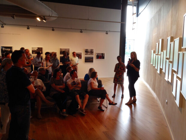 Sophie Gerrard talks to the audience at Impressions Gallery about her body of work 'Drawn To The Land: Women working the Scottish landscape', which is exhibited as part of 'Beyond The Border: New Contemporary Photography from Scotland' on show at Impressions Gallery Bradford 1st July - 27th September 2014. image © Colin McPherson July 2014