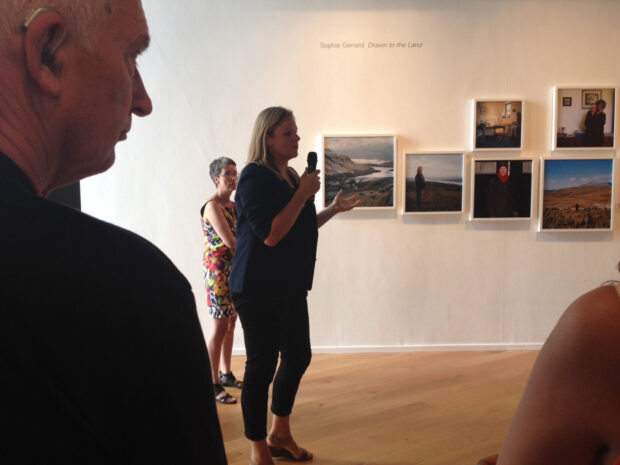 Sophie Gerrard talks to the audience at Impressions Gallery about her body of work 'Drawn To The Land: Women working the Scottish landscape', which is exhibited as part of 'Beyond The Border: New Contemporary Photography from Scotland' on show at Impressions Gallery Bradford 1st July - 27th September 2014. image © Jeremy Sutton-Hibbert July 2014