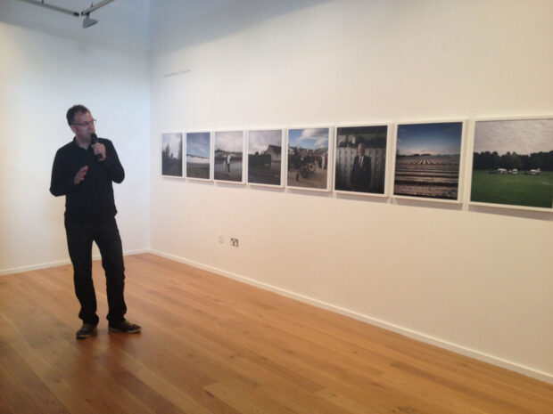 Colin McPherson talks to the audience at Impressions Gallery about his body of work 'A Fine Line', which is exhibited as part of 'Beyond The Border: New Contemporary Photography from Scotland' on show at Impressions Gallery Bradford 1st July - 27th September 2014. image © Sophie Gerrard July 2014