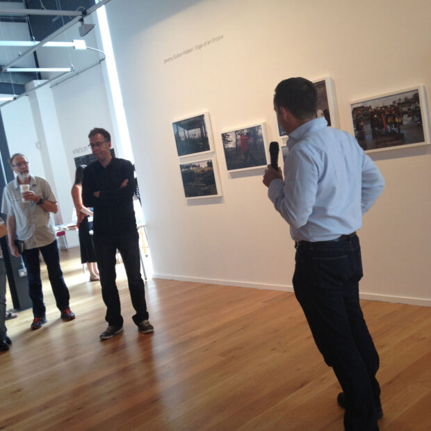 Jeremy Sutton-Hibbert talks to the audience at Impressions Gallery about his body of work 'Edge of an Empire', which is exhibited as part of 'Beyond The Border: New Contemporary Photography from Scotland' on show at Impressions Gallery Bradford 1st July - 27th September 2014. image © Sophie Gerrard July 2014