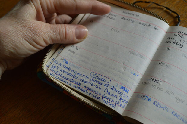Mother holding open her diary March 19th 1976, describing her first date with my father. From 'Mother, Father' by Lucie Rachel. ©Lucie Rachel 2015, all rights reserved.